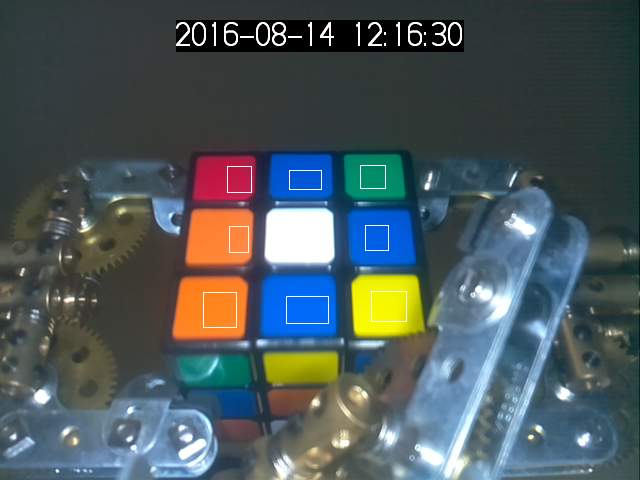 The photo of the cube with marked regions for color recognition